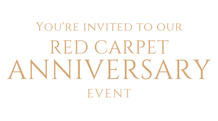 Black invitation banner with copper lettering reading, "You're invited to our Red Carpet Anniversary Event" in elegant typography.