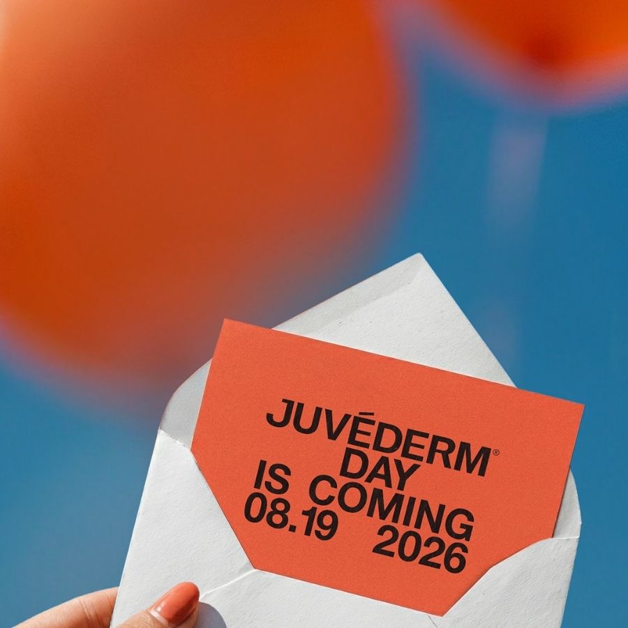 Orange card in an envelope announcing 'Juvederm Day is Coming 08.19 2026'.